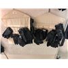 Image 1 : "Motherland: Fort Salem" - Large group of black gloves