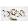 .830 STERLING SPOON AND 4 TRENCH ART NAPKIN RINGS