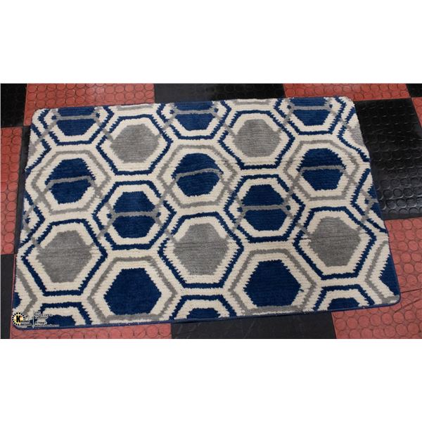 NEW UNPACKED 47 X 31.5  BATHROOM RUG WITH RUBBER