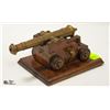 Image 1 : VINTAGE BRASS AND WOOD CANNON