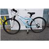 Image 1 : WHITE AND BLUE REEBOK BIKE