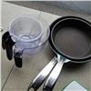 Image 2 : THE ROCK GRIDDLE AND 2 FRYING PANS WITH MEASURING CUPS AND HENKELS CUTTING BOARDS
