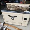 Image 2 : VINTAGE SUPERIOR OVEN/STOVE WORKING WITH ANTIQUE GOLF CLUBS LEFT AND RIGHT WITH BOW