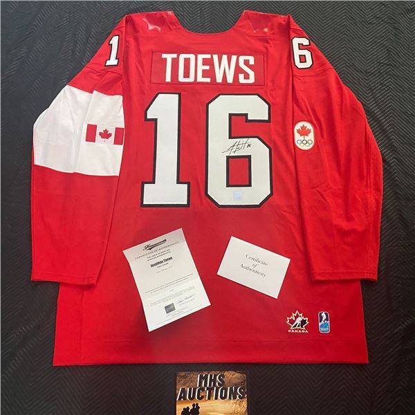 JONATHAN TOEWS FRAMEWORTH AUTOGRAPHED 2014 TEAM CANADA JERSEY WITH FRAMEWORTH C.O.A