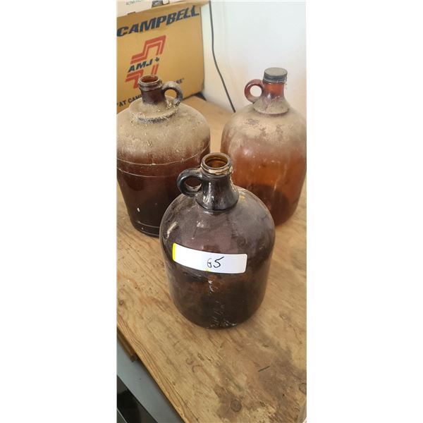 THREE AMBER 1GAL GROWLERS