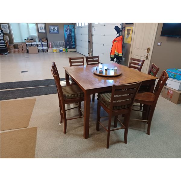 36 X 54  HIGHTOP TABLE COMES WITH 18  LEAF EIGHT CHAIRS