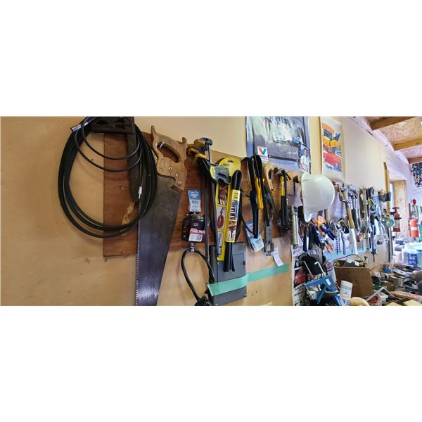 Tools on wall. Cat E.