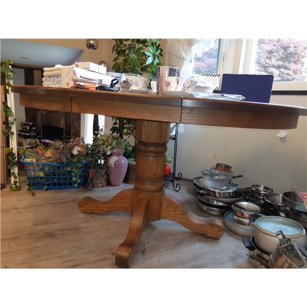 Wood dinning table.  Cat C.
