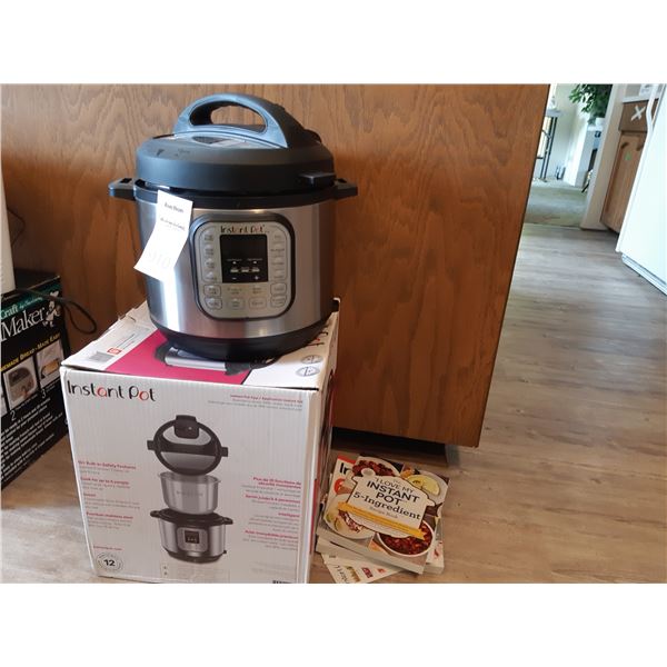 Instant Pot with Manuals. Cat A.