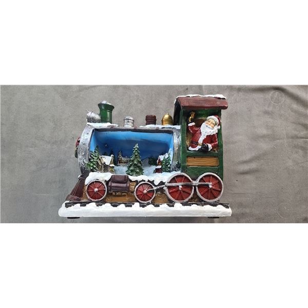 CHRISTMAS TRAIN LIGHTS UP AND PLAYS CARROLS WITH WIND UP