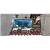 Image 6 : CHRISTMAS TRAIN LIGHTS UP AND PLAYS CARROLS WITH WIND UP