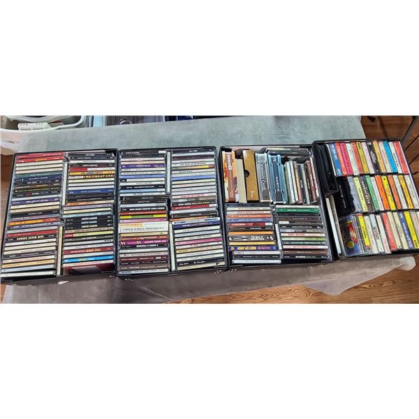 FOUR CASES OF CD'S(3) AND CASSETTES(1)