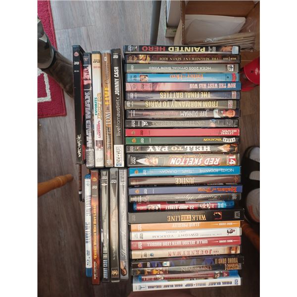 AN ASSORTMENT OF DVD'S - MOVIES AND DOCUMENTARIES - PLEASE SEE IMAGES FOR MORE DETAILS
