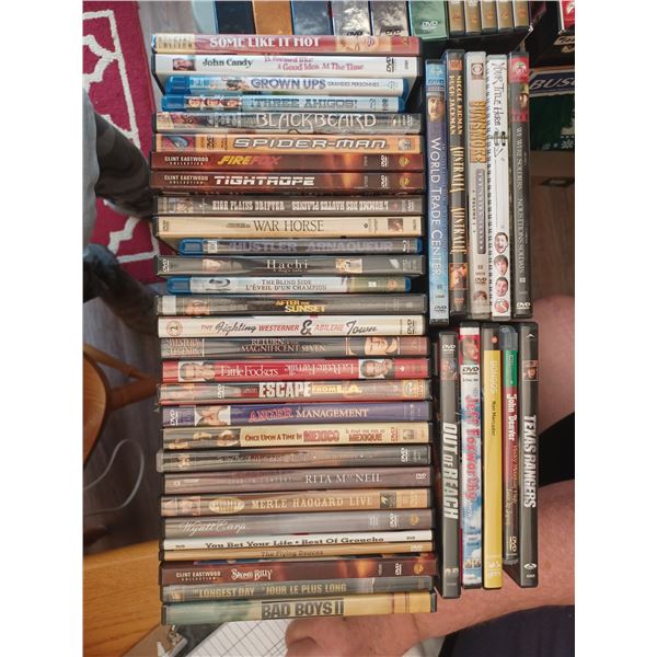 AN ASSORTMENT OF DVD'S - MOVIES AND DOCUMENTARIES - PLEASE SEE IMAGES FOR MORE DETAILS