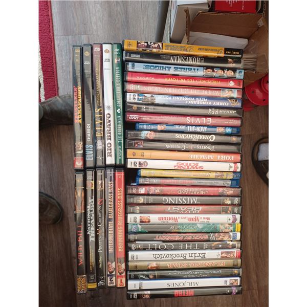 AN ASSORTMENT OF DVD'S - MOVIES AND DOCUMENTARIES - PLEASE SEE IMAGES FOR MORE DETAILS