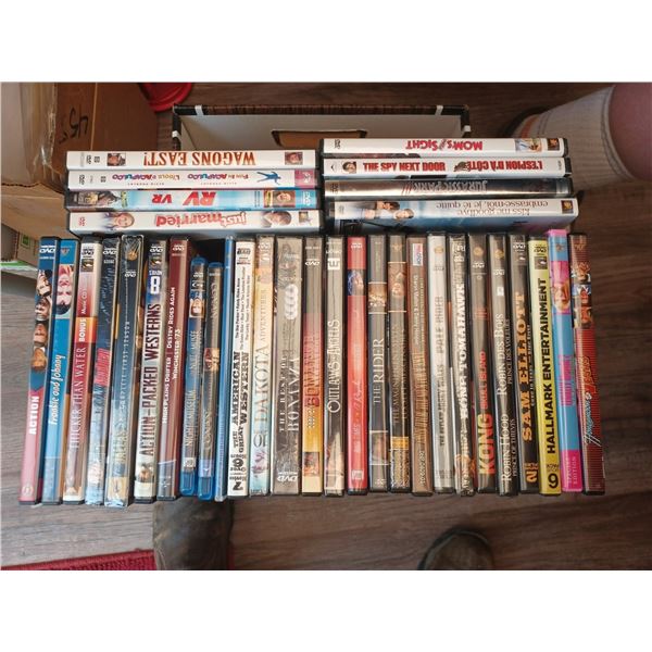 AN ASSORTMENT OF DVD'S - MOVIES AND DOCUMENTARIES - PLEASE SEE IMAGES FOR MORE DETAILS