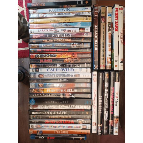 AN ASSORTMENT OF DVD'S - MOVIES AND DOCUMENTARIES - PLEASE SEE IMAGES FOR MORE DETAILS