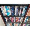 Image 3 : 150+/- VHS AND DVDS - COMES WITH SHELVING UNIT. PLEASE SEE IMAGES FOR MORE INFO