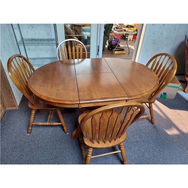 OAK TABLE AND FOUR CHAIRS