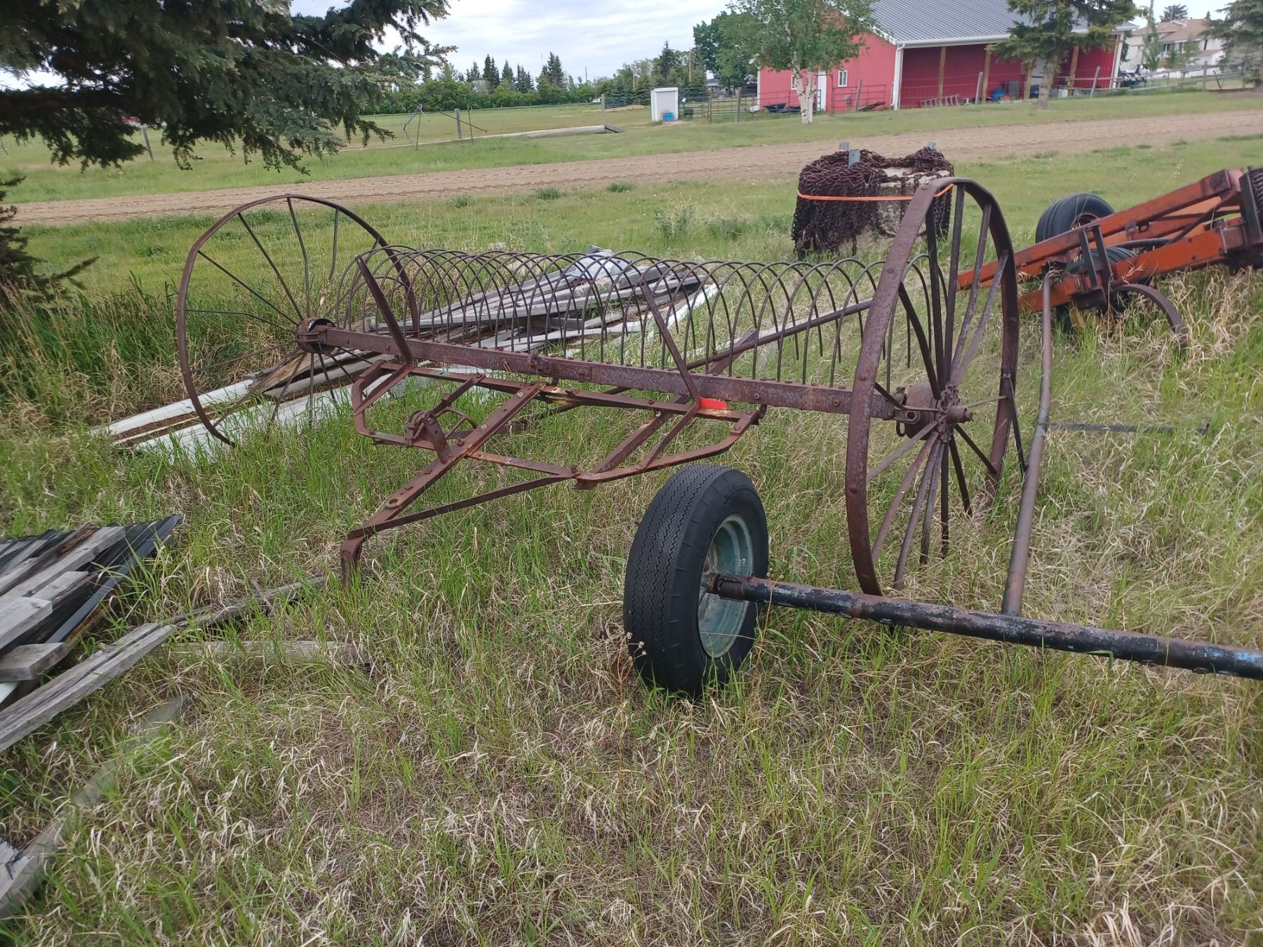 ANTIQUE RAKE ON STEEL WHEELS & 2 WHEELED DRAW BARS