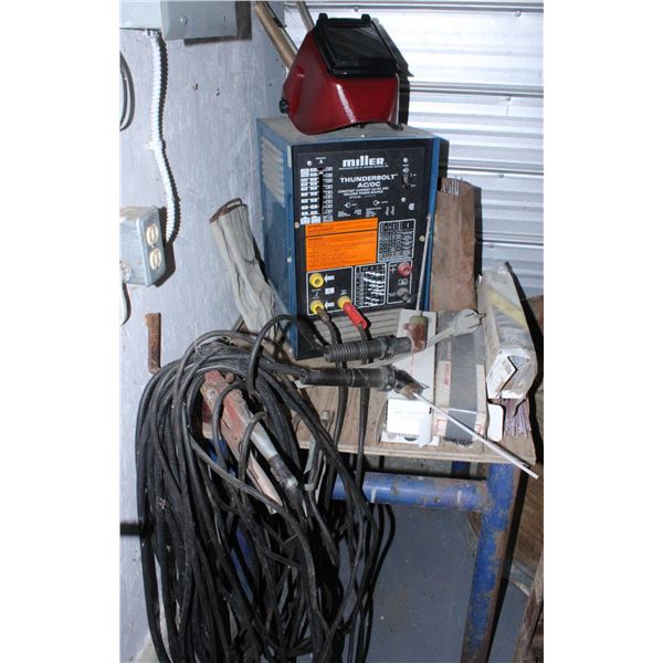 MILLER THUNDERBOLT AC/DC ARC WELDER W/ ASSORT. RODS, HELMET, GLOVES AND ...