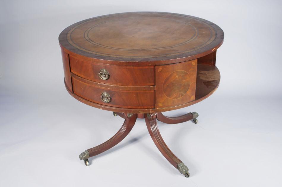 A Style Mahogany Circular Library Table.