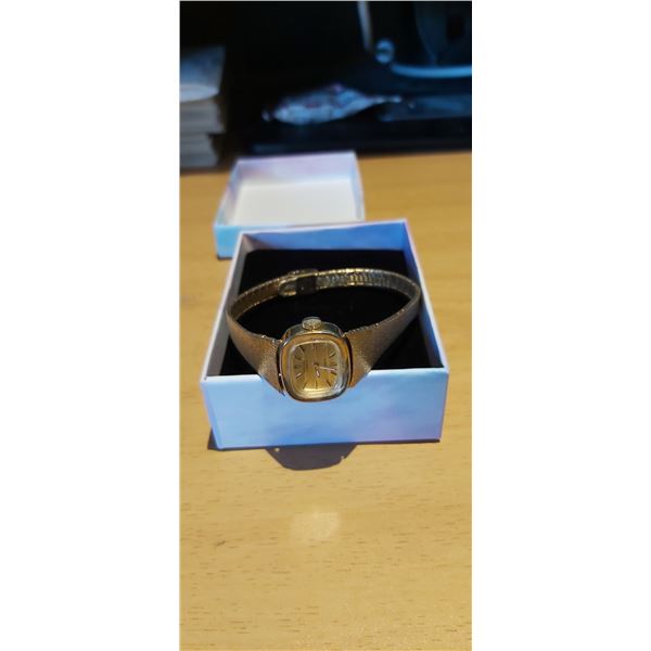 Cardinal Ladies Gold Tone Watch
