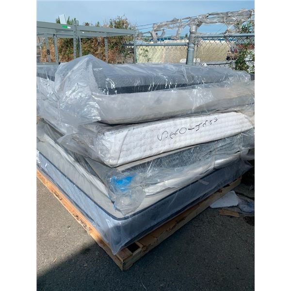 PALLET LOT - 4 king size premium pillow top mattresses. in plastic and showroom samples - note: thes