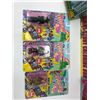 Image 2 : Oz - Ruby slippers w/ box, 3 wind-up walkers mint on card, magic wand on card & oversized colouring