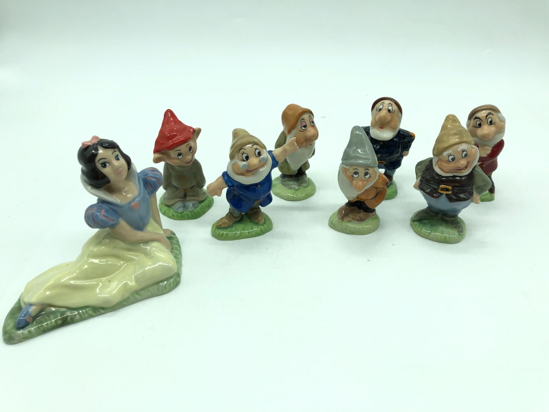 Set of snow white & the seven dwarfs ceramic figurines Approx 3" tall