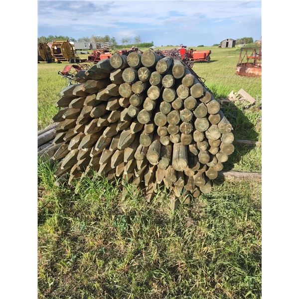 145X THE BID PRICE - Bundle of (145) treated fence posts - 4" x 5'