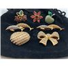 Image 2 : "Swarovski" - Group of 7 Swarovski pins w/ crystals & soft pouch