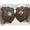 Image 1 : Group of 2 wooden wall décor shields - includes McKay signed shield & Marchiori signed shield - appr