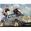 Image 1 : PAUL WALKER AND VIN DIESEL DUAL-SIGNED 8X10 PHOTO (RA COA)
