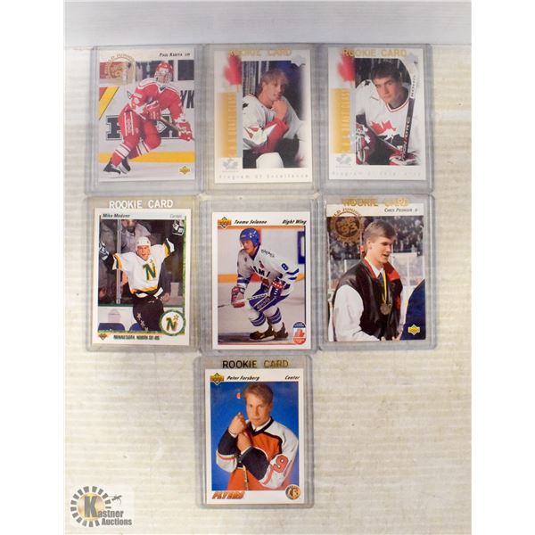 7 X ROOKIE HOCKEY CARDS IN PROTECTIVE CASES