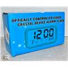 Image 1 : NEW OPTICALLY CONTROLLED LCD ALARM CLOCK