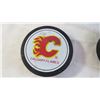 Image 2 : Calgary Flames and Badges hockey pucks