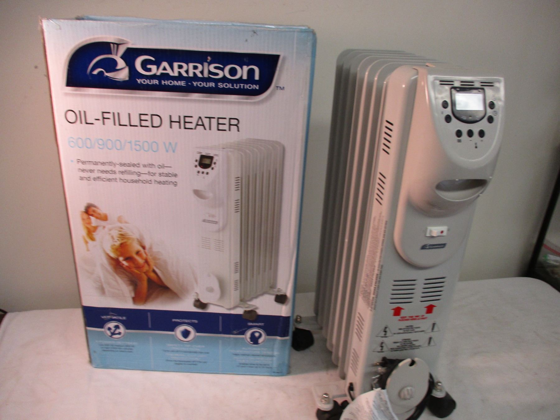 *Garrison oilfilled heater 600w1500w Bodnarus Auctioneering