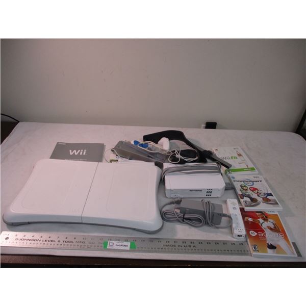 Wii system with games, controllers, fit board