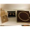 Image 1 : Avon Jewelry in original cases – ladies pocket watch on a chain, necklace and earring and chain set