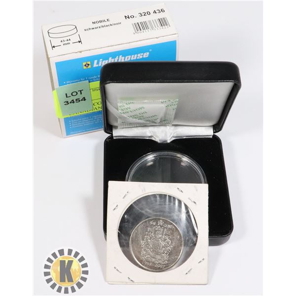 NOBILE COIN CAPSULE WITH CANADIAN 50 CENT PIECE