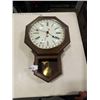 Image 1 : WEST GERMAN WALL CLOCK WITH PENDULUM AND KEY
