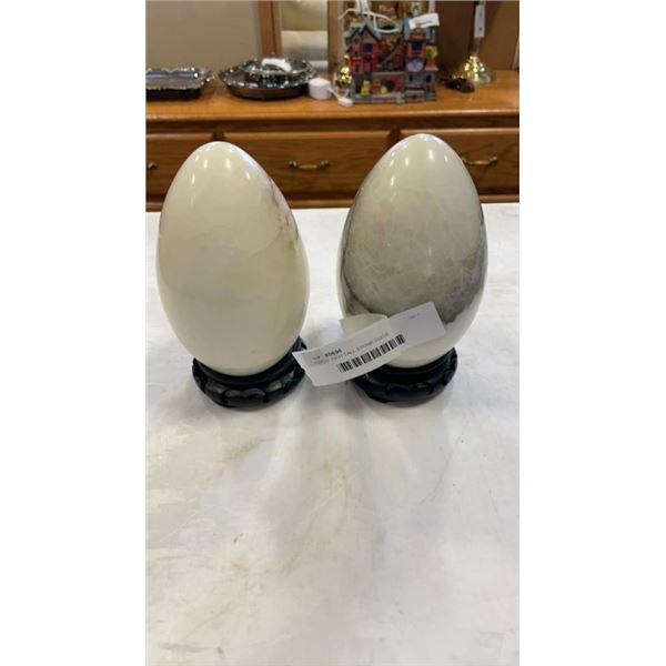 TWO 6 INCH TALL STONE EGGS