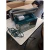 Image 2 : BISSELL LITTLE GREEN MACHINE WORKING