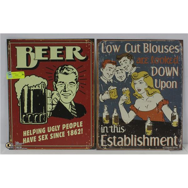 2 METAL MAN CAVE SIGNS