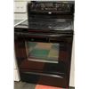 Image 1 : WHIRLPOOL BLACK GLASS TOP STOVE