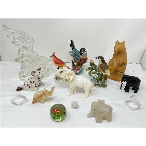 14- Animal figurenes including elephants and birds