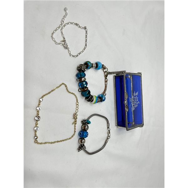 Lot of 4 mixed ladies bracelets including charm sets