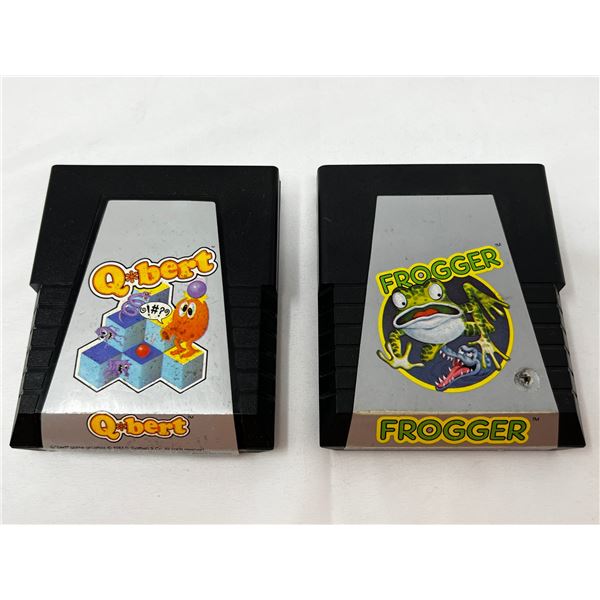 Vintage Qbert and Frogger game cartridges
