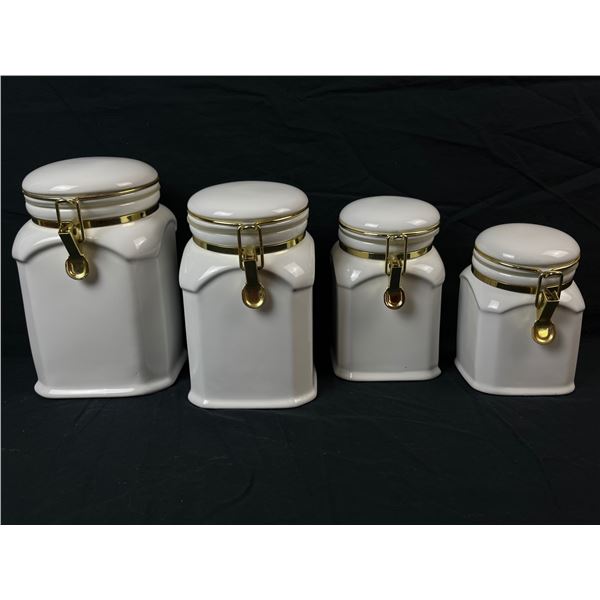 Set of 4 different porcelean storage jars
